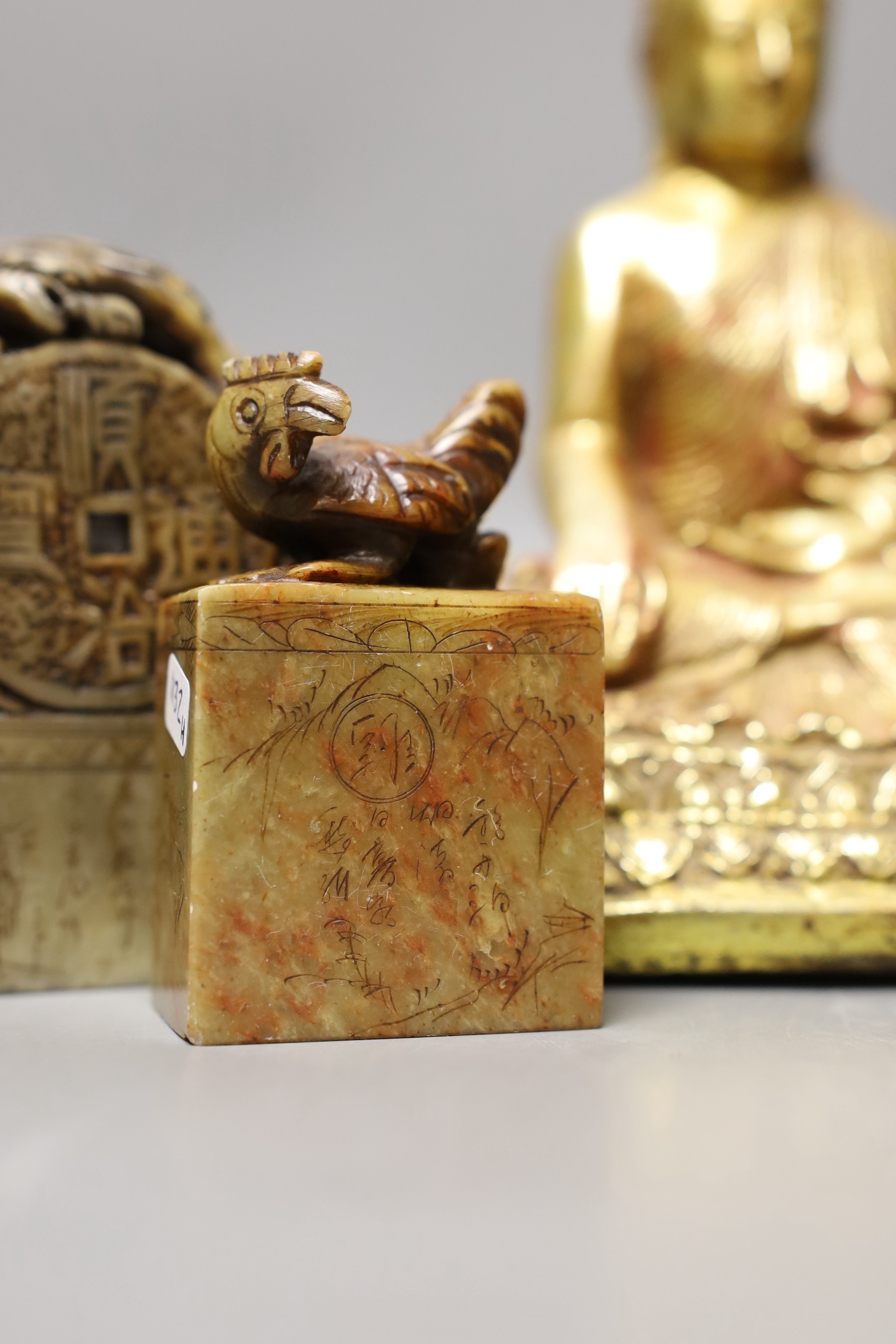 A group of Chinese soapstone carvings, a composition portable shrine and a Buddha figure (7)